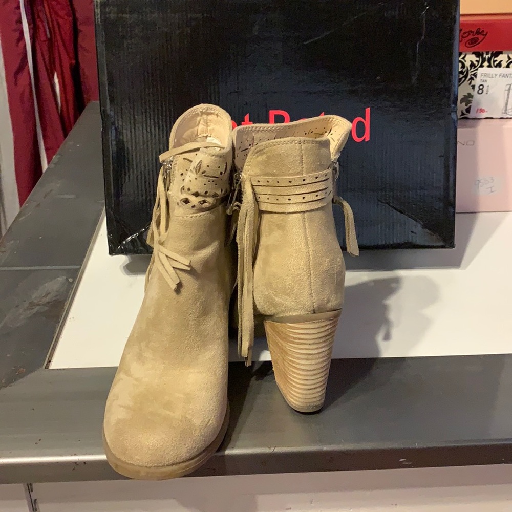 Cream colored booties in original box